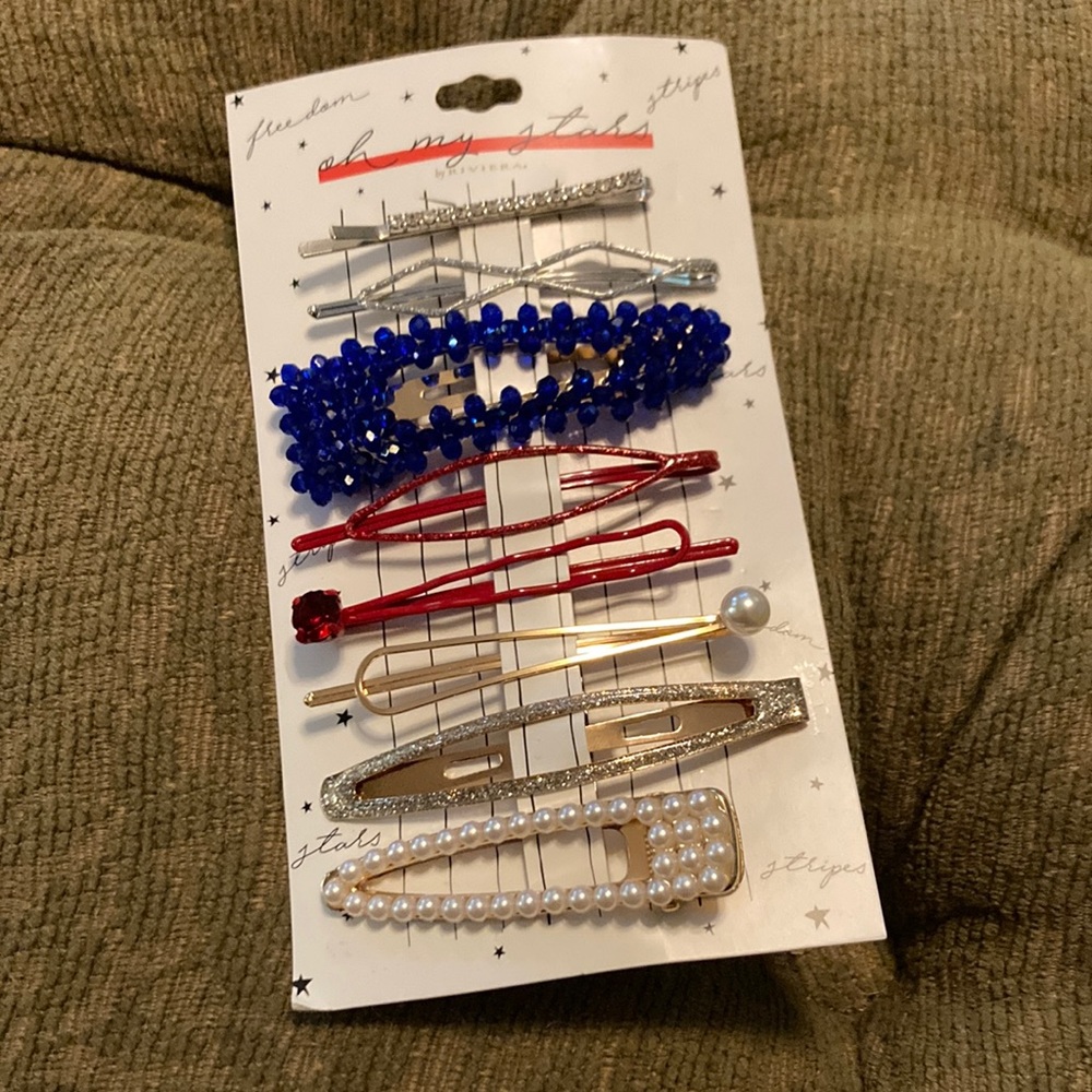 New with package set of 8 “Oh My Stars” assorted snap clips and barrettes.
